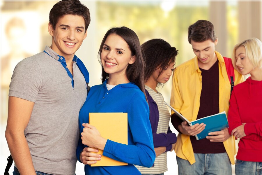 group-students-with-books-background_488220-6196