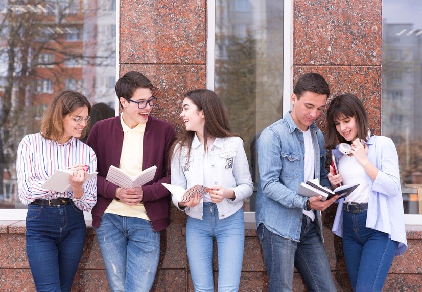 young-people-standing-with-books-reading-it-discussing-content_23-2148166303